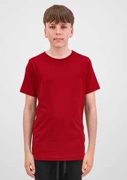 A red short sleeve t-shirt displayed on a model, featuring a simple design and a logo on the front.