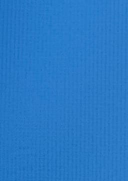 A blue, textured fabric showcasing a button-up shirt design. Features a logo in the corner.