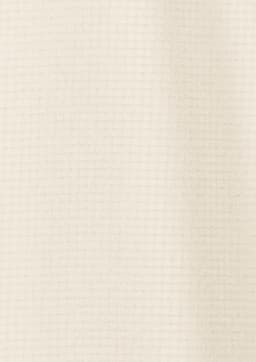 A light cream short sleeve shirt with a textured pattern and a logo.
