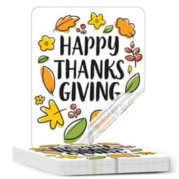 A stack of removable static cling decals featuring a colourful autumn design with flowers and leaves, stating "Happy Thanksgiving."