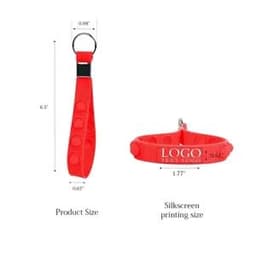 A red Push Pop stress reliever keychain with a ring for attachment and a space for branding.