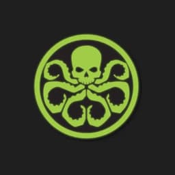 A circular emblem featuring a green skull surrounded by octopus tentacles on a black background.