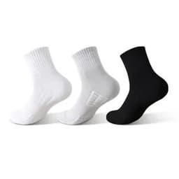 A collection of quarter cushioned sports socks in white and black, featuring a non-slip design and logos.