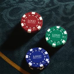 Three plastic poker chips in red, green, and blue, each featuring a logo design.