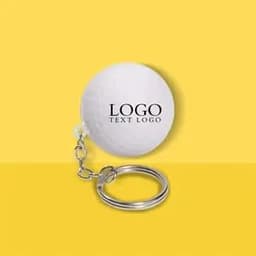 A white golf ball stress ball keychain with a metal ring attachment and a logo design.
