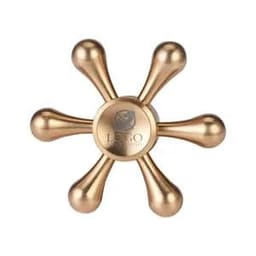 A gold rudder-shaped fidget spinner with multiple rounded arms and a central logo.