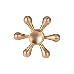 A rudder-shaped fidget spinner in a shiny gold finish with five rounded arms and a central hub.