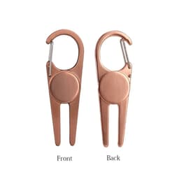 A copper golf divot tool with a clip hook, featuring a smooth front and a pronged back for fixing divots.