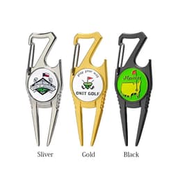 Three golf divot repair tools in silver, gold, and black, each featuring a logo or branding on the handle.