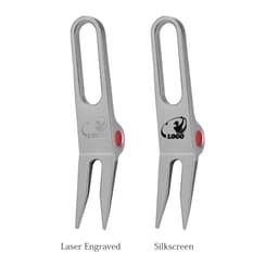 A metal golf divot tool with a sleek silver finish and a red accent, featuring branding on one side.