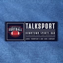 A rectangular promotional label in navy and white with a sports bar logo and an American football graphic.