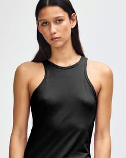 A black women's racerneck tank top with a fitted design and a subtle logo.