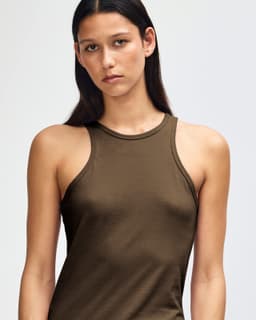 A women's racerneck tank in olive green with a fitted design and a subtle logo.