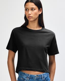 A black women's fine jersey boxy T-shirt with a relaxed fit, featuring a round neckline and short sleeves.