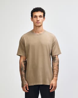 A unisex heavyweight cotton t-shirt in a muted brown colour with a simple design and a logo.