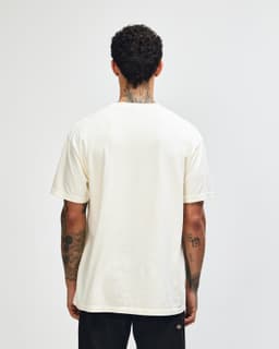 A unisex heavyweight cotton T-shirt in cream colour, viewed from the back. The shirt has a logo on it.