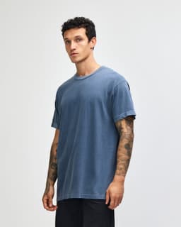 A unisex heavyweight cotton T-shirt in a deep navy colour with a relaxed fit and a logo.
