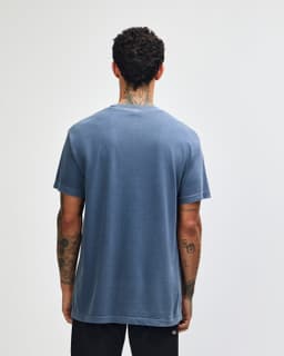 A navy unisex heavyweight cotton T-shirt displayed from the back, featuring a simple design and short sleeves.