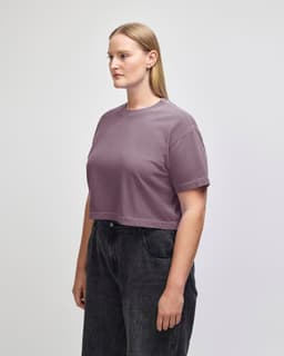 A garment dyed crop boxy T-shirt in a mauve colour, featuring a relaxed fit and short sleeves.