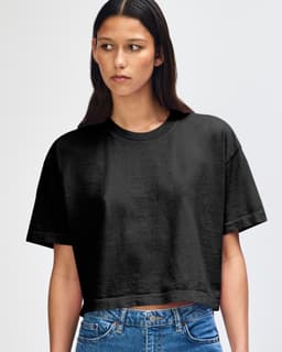 A black heavyweight cotton women's crop boxy T-shirt with short sleeves, displayed on a model.