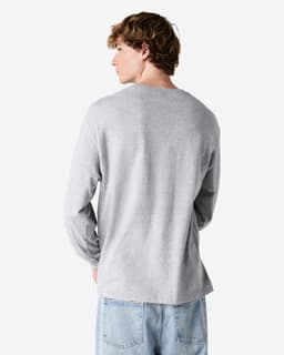 A unisex long sleeve T-shirt in grey, featuring a subtle logo on the back.