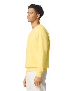 A lightweight crewneck sweatshirt in yellow, featuring a relaxed fit and long sleeves, with a logo on the front.