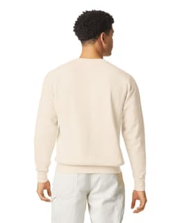 A lightweight crewneck sweatshirt in a cream colour, featuring a classic design and a logo on the back.