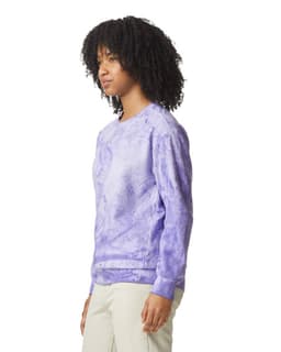 A purple tie-dye crewneck sweatshirt with long sleeves and a logo on the front.