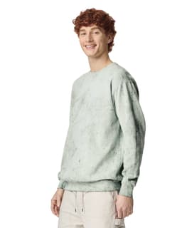 A mint green crewneck sweatshirt with a relaxed fit and long sleeves, featuring a logo on the front.