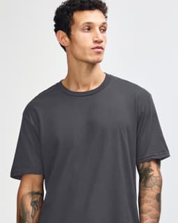 A grey short sleeve t-shirt featuring a relaxed fit and branding on the label.