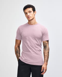 A unisex fine jersey short sleeve t-shirt in a muted mauve colour, featuring a relaxed fit and no visible branding.