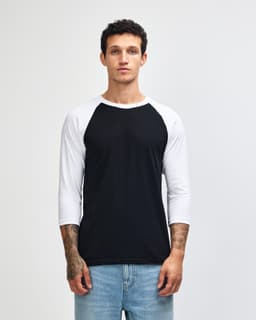 A unisex raglan T-shirt featuring black body and white sleeves, with a logo on the front.