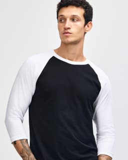 A unisex raglan t-shirt featuring a black body and white sleeves, designed with a logo.