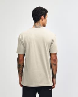 A beige unisex Henley T-shirt with short sleeves and a simple design, featuring a logo on the back.