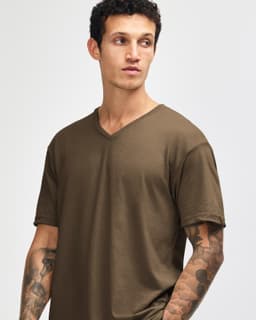 A unisex V-neck T-shirt in olive green, featuring short sleeves and a relaxed fit. It has a subtle logo.