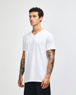 A white unisex V-neck T-shirt in a side view, featuring a simple design and a slight fit.