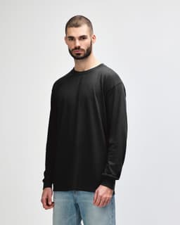A long sleeve T-shirt in dark grey, featuring a simple design and a logo on the front.