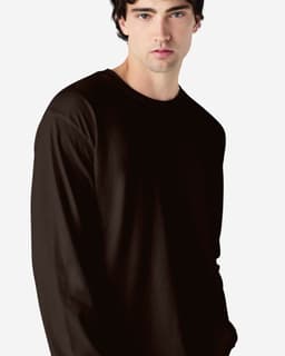 A model wearing a black long sleeve T-shirt made from Ultra Cotton fabric, featuring a subtle logo.