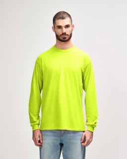 A bright yellow long sleeve t-shirt made from ultra cotton, featuring a logo on the front.
