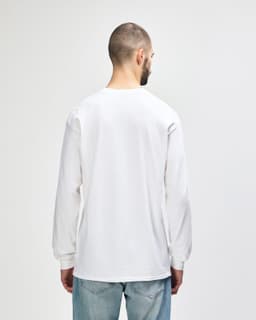 A man wearing a white Gildan Ultra Cotton adult long sleeve t-shirt, viewed from the back.