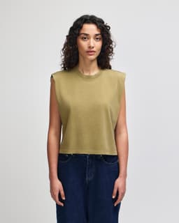 A women's muscle T-shirt in olive green, featuring a sleeveless design with a cropped fit and a logo.
