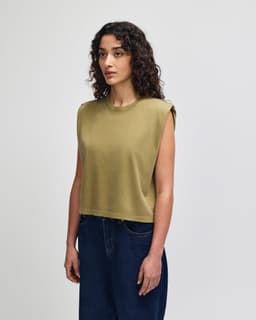 A women's muscle T-shirt in olive green, featuring a cropped design and sleeveless style. It has branding on it.