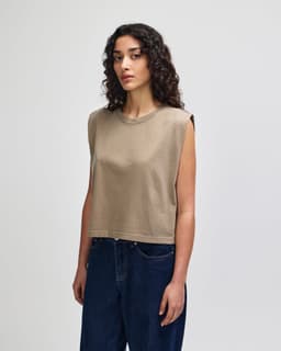 A women's muscle T-shirt in olive green with a relaxed fit and sleeveless design, featuring a logo.