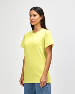A yellow Gildan Heavy Cotton Adult T-Shirt displayed on a model, featuring a simple design and a relaxed fit.