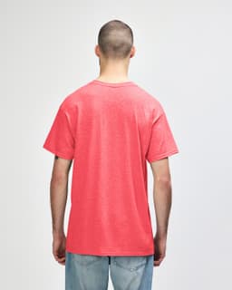 A pink Gildan Heavy Cotton Adult T-Shirt, displayed from the back, featuring a plain design.