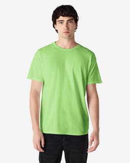 A green Gildan Heavy Cotton Adult T-Shirt displayed on a model, featuring a simple design and crew neck.
