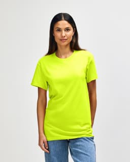 A bright neon yellow Gildan Heavy Cotton adult t-shirt on a model, featuring a simple crew neck design and short sleeves.