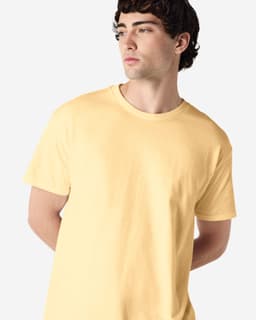 A yellow Gildan Heavy Cotton adult T-shirt, featuring a crew neck and a model displaying the side profile.