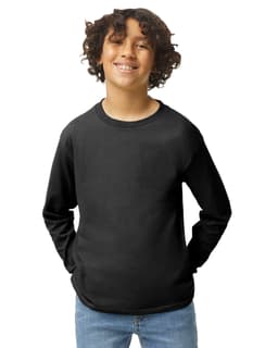 A youth long sleeve T-shirt in black, featuring a round neckline and a logo detail, worn by a smiling child.