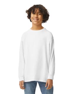 A youth wearing a white long sleeve T-shirt. The shirt has a logo on its front.